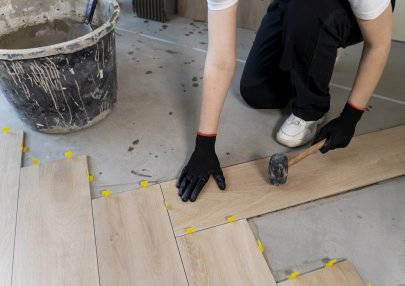 high-angle-worker-tiling-floor